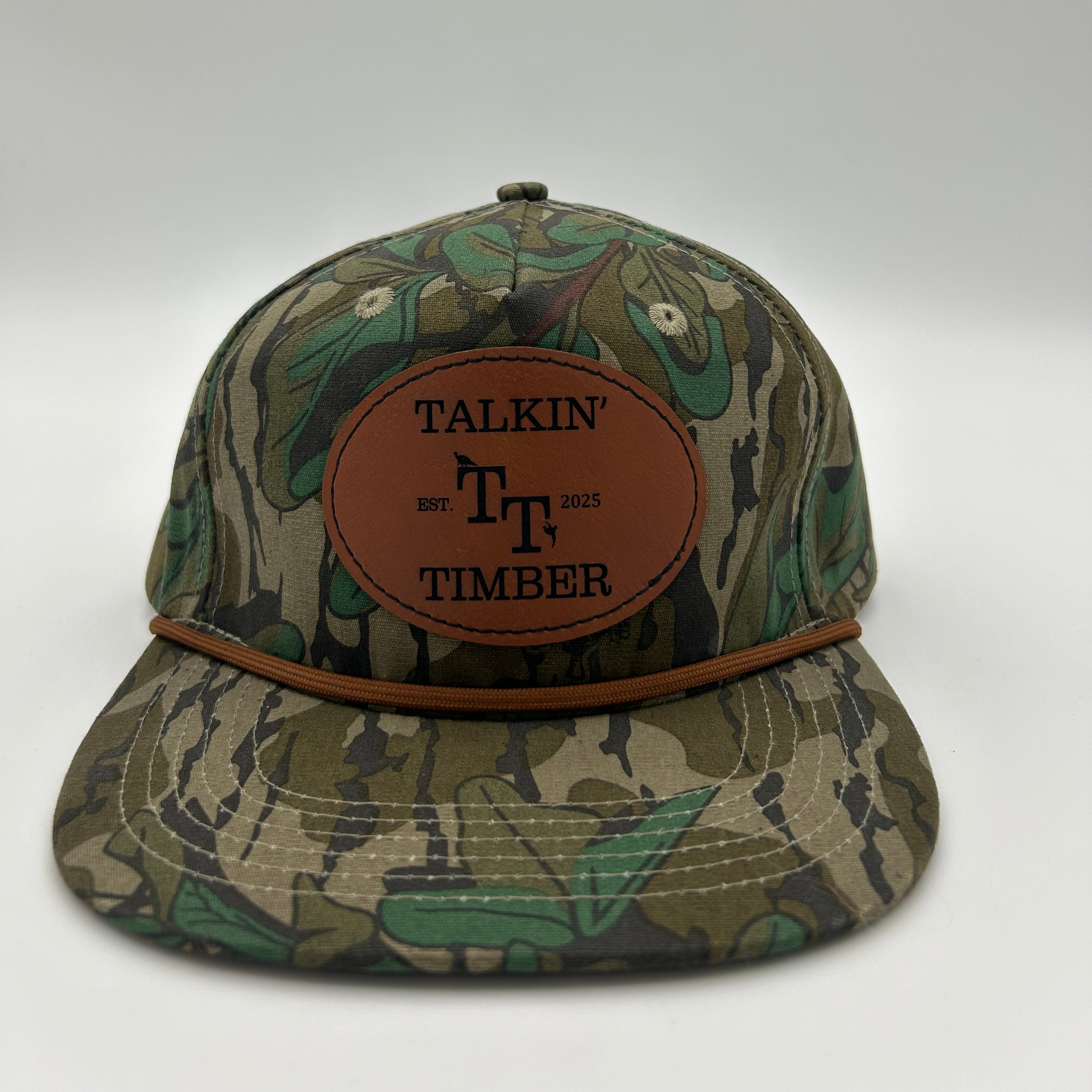Front view of the Talkin' Timber Mossy Oak Greenleaf Rope Hat Featuring Hand-Pressed Leather Patch