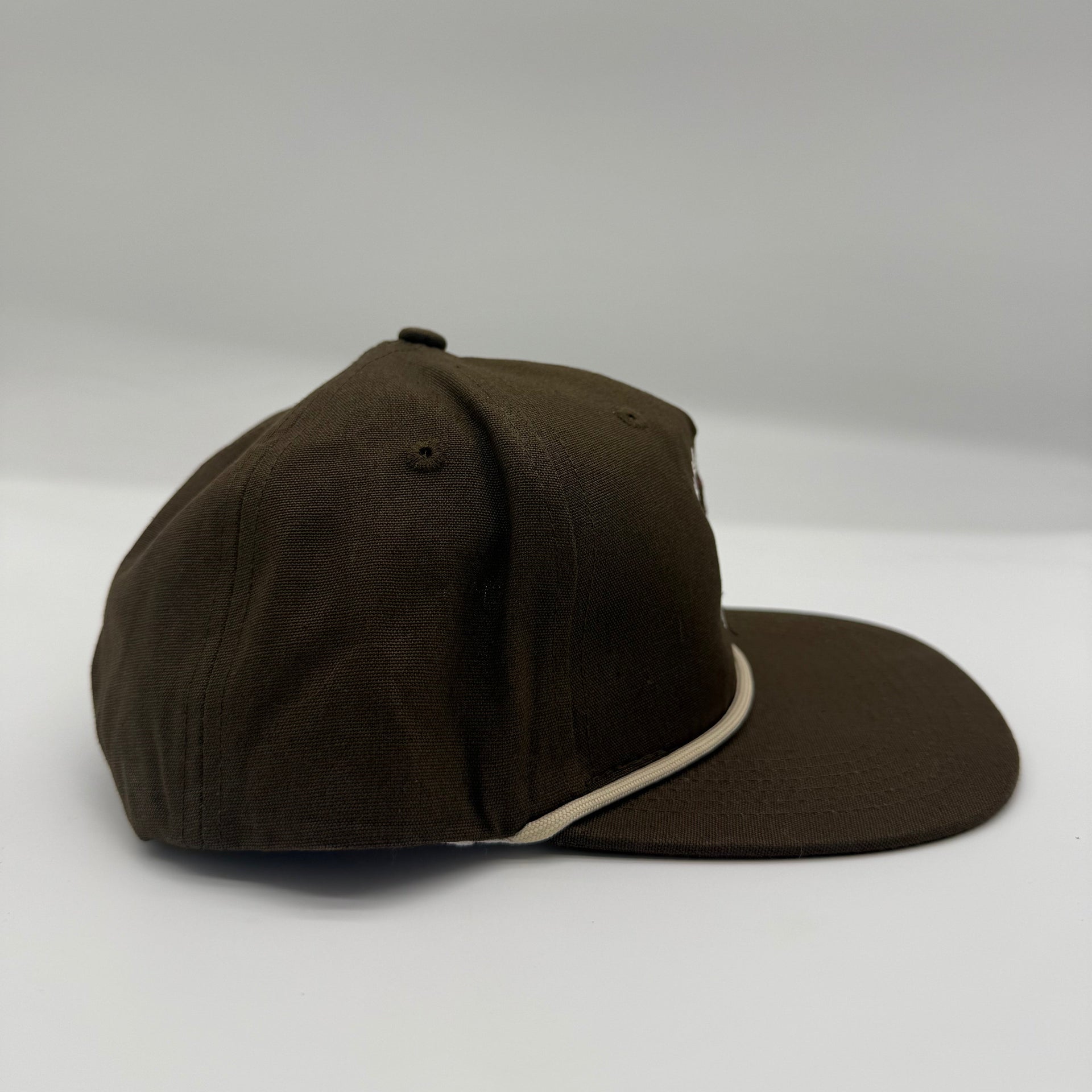 Brown cap on a white background
