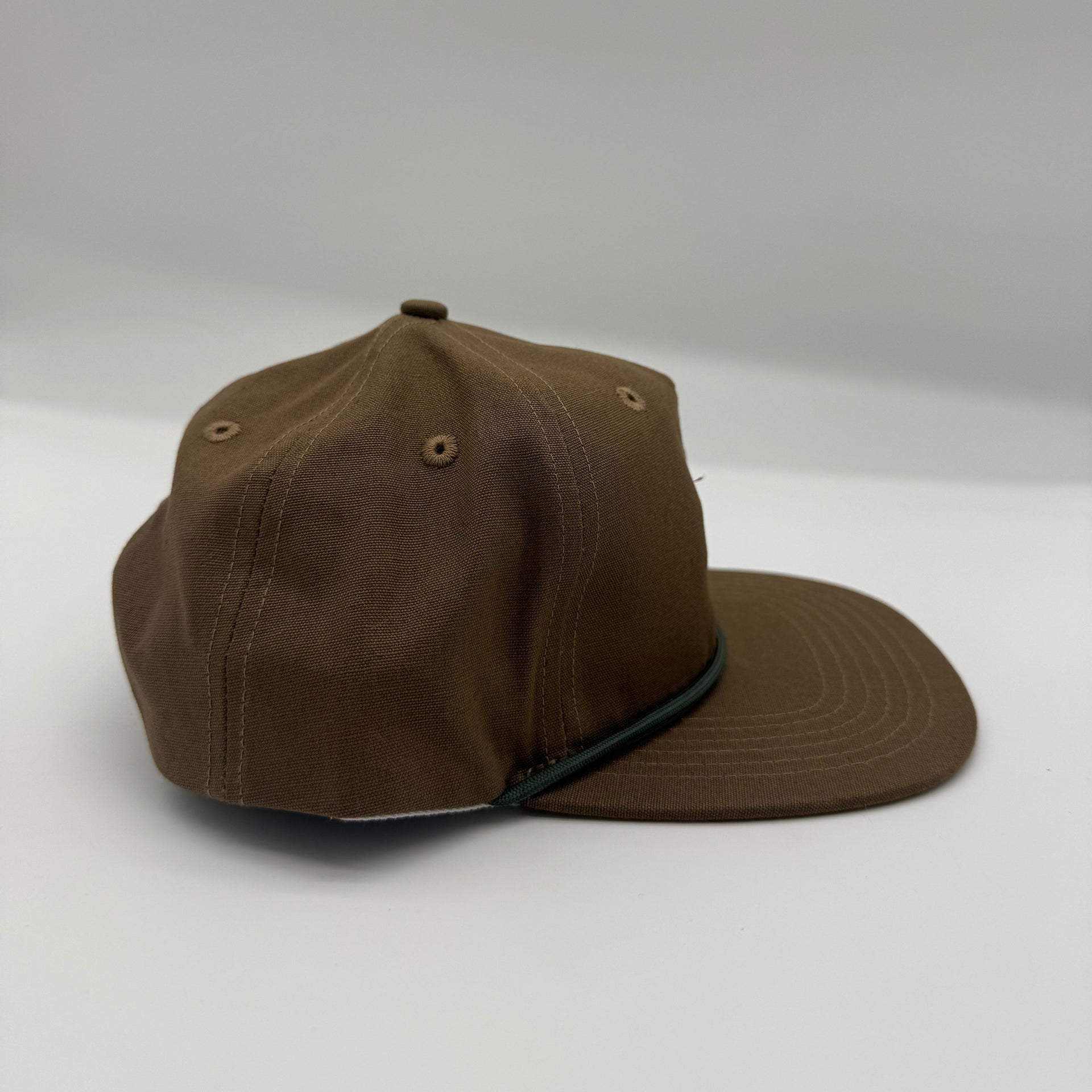 Brown cap on a white background