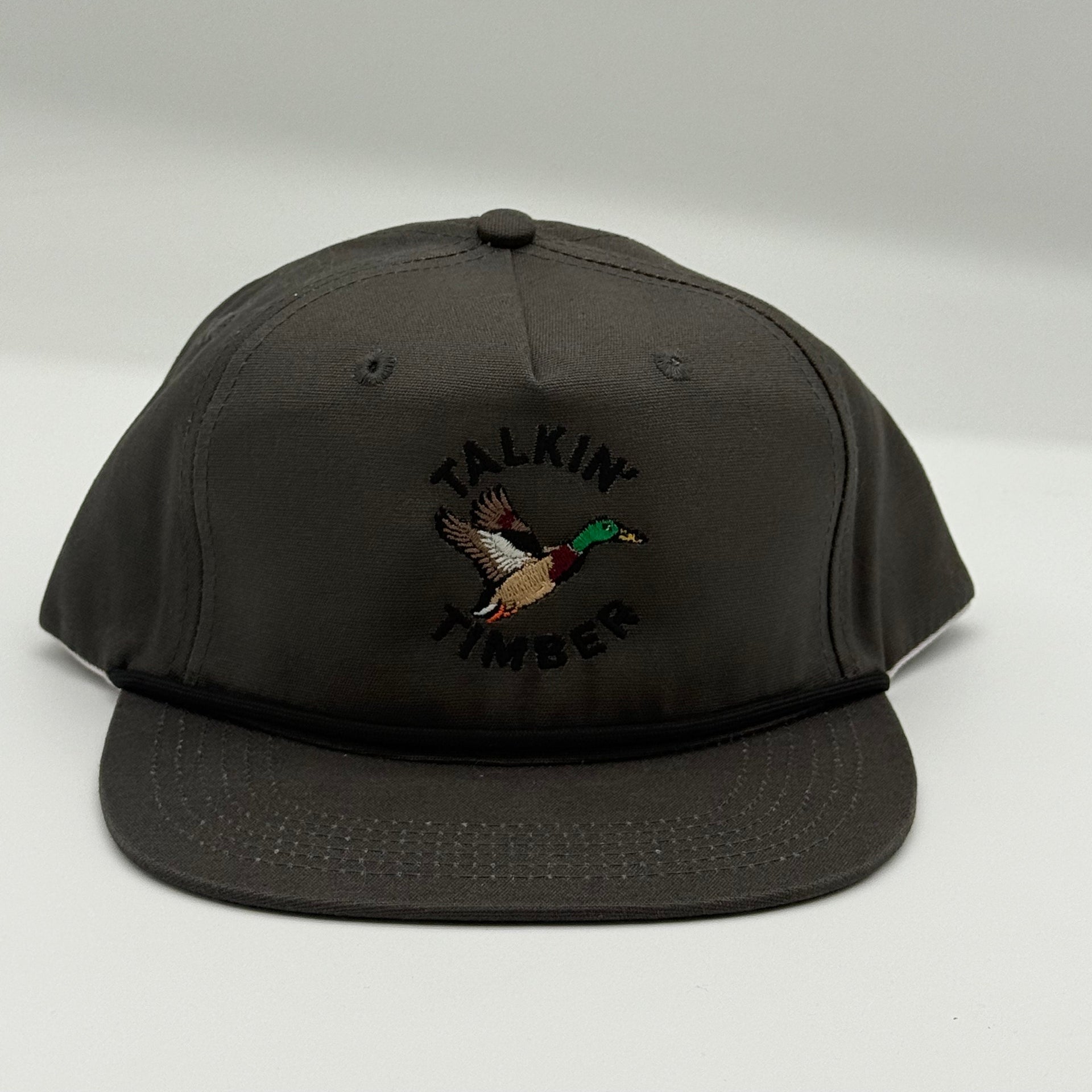 Black cap with duck logo on a white background