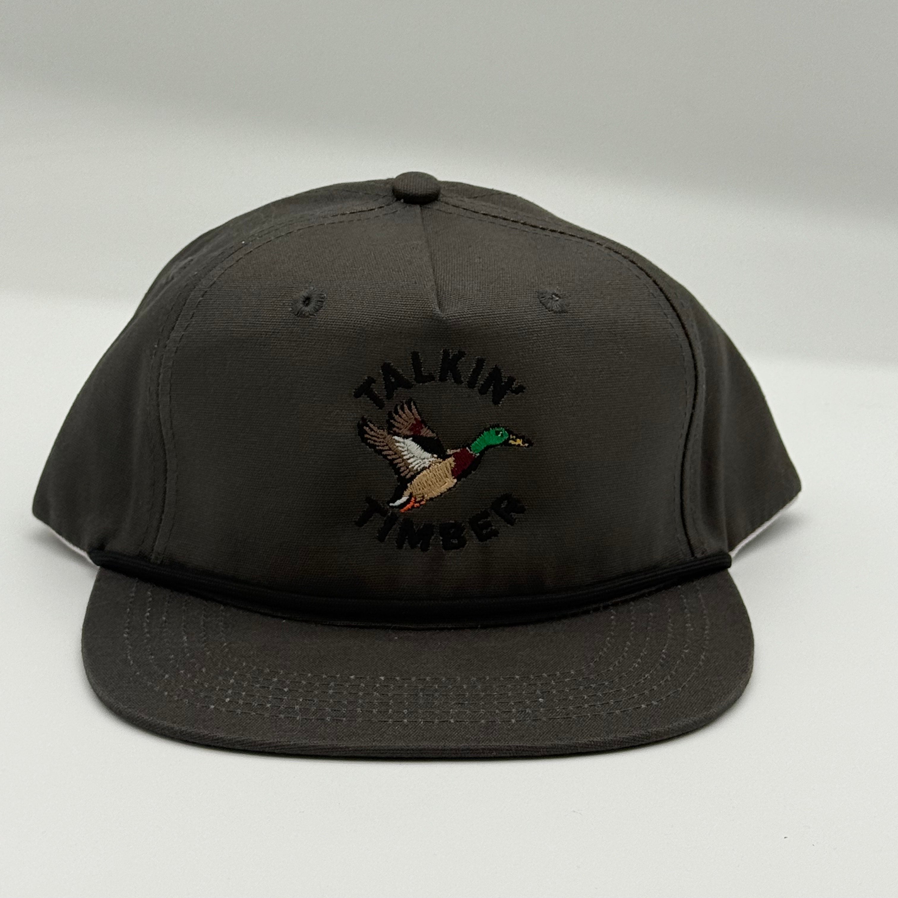 Black cap with duck logo on a white background