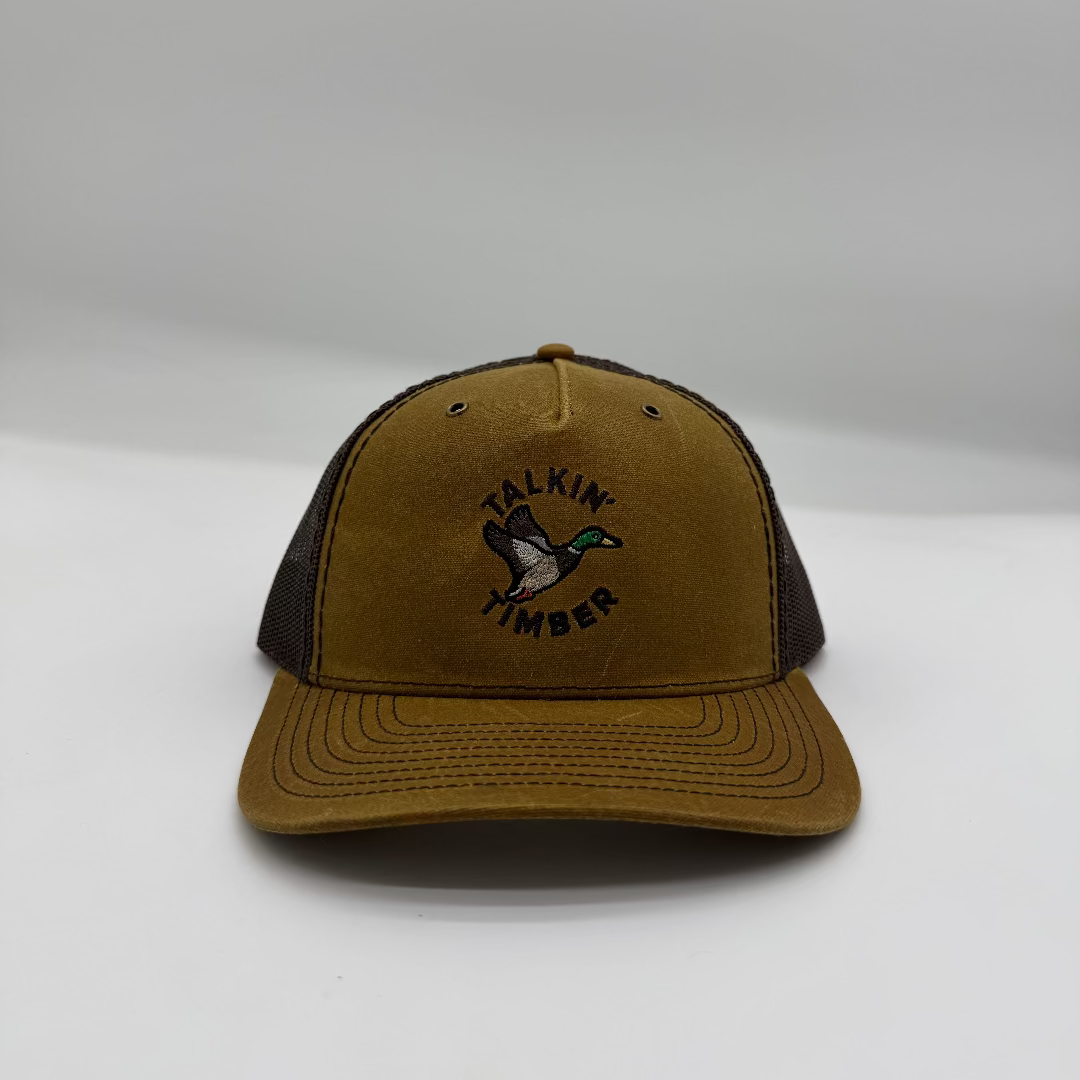 Brown and black cap with duck logo and 'Talkin Timber' text on a white background