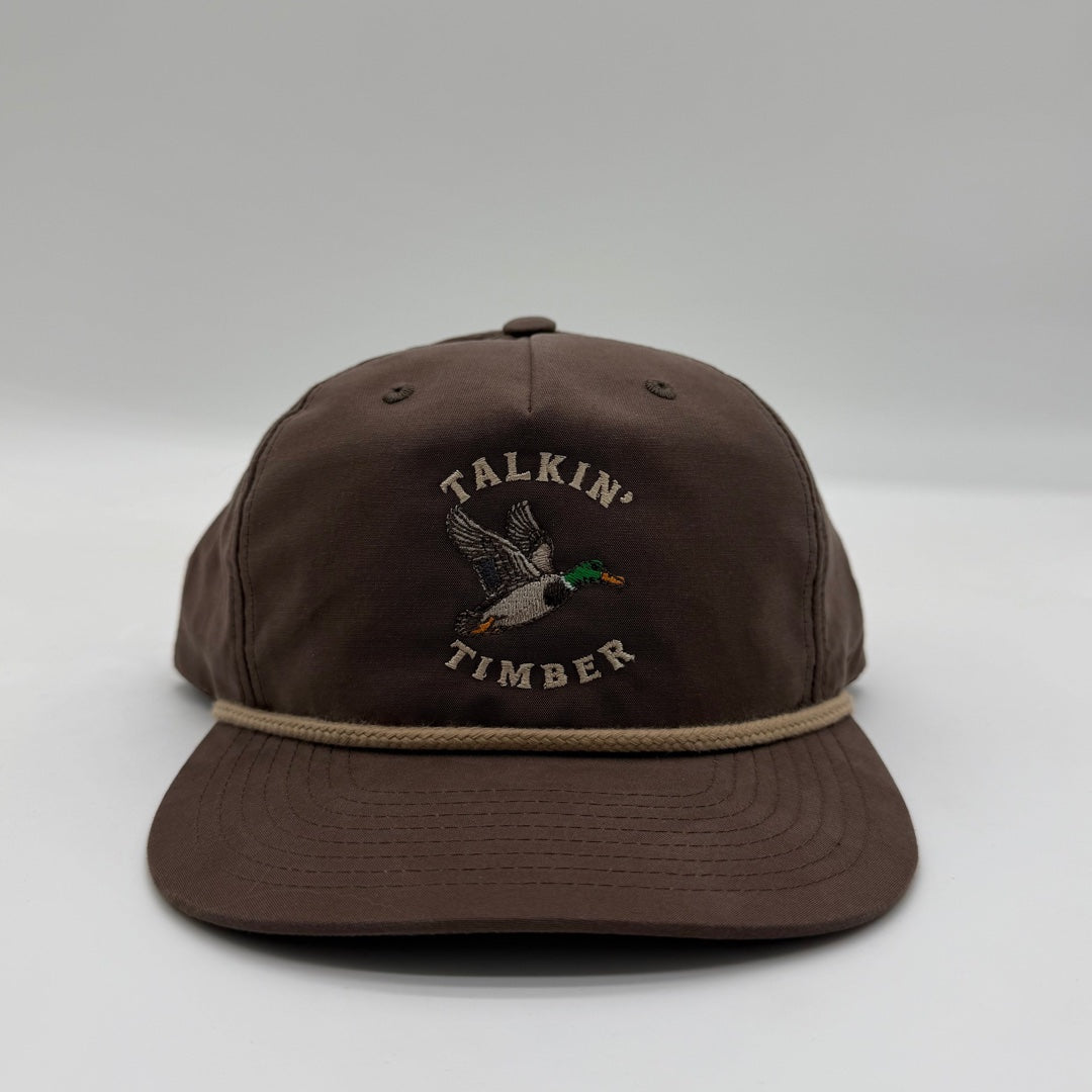 Front view of the Talkin’ Timber Brown Mallard Hat with a brown crown and bill, tan rope, and flying mallard embroidery.