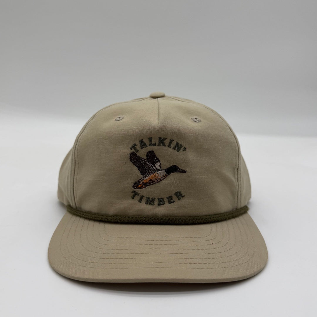 Front view of The Ram Hat by Talkin’ Timber, with a khaki crown and bill, dark rope, and embroidered Northern Shoveler duck.