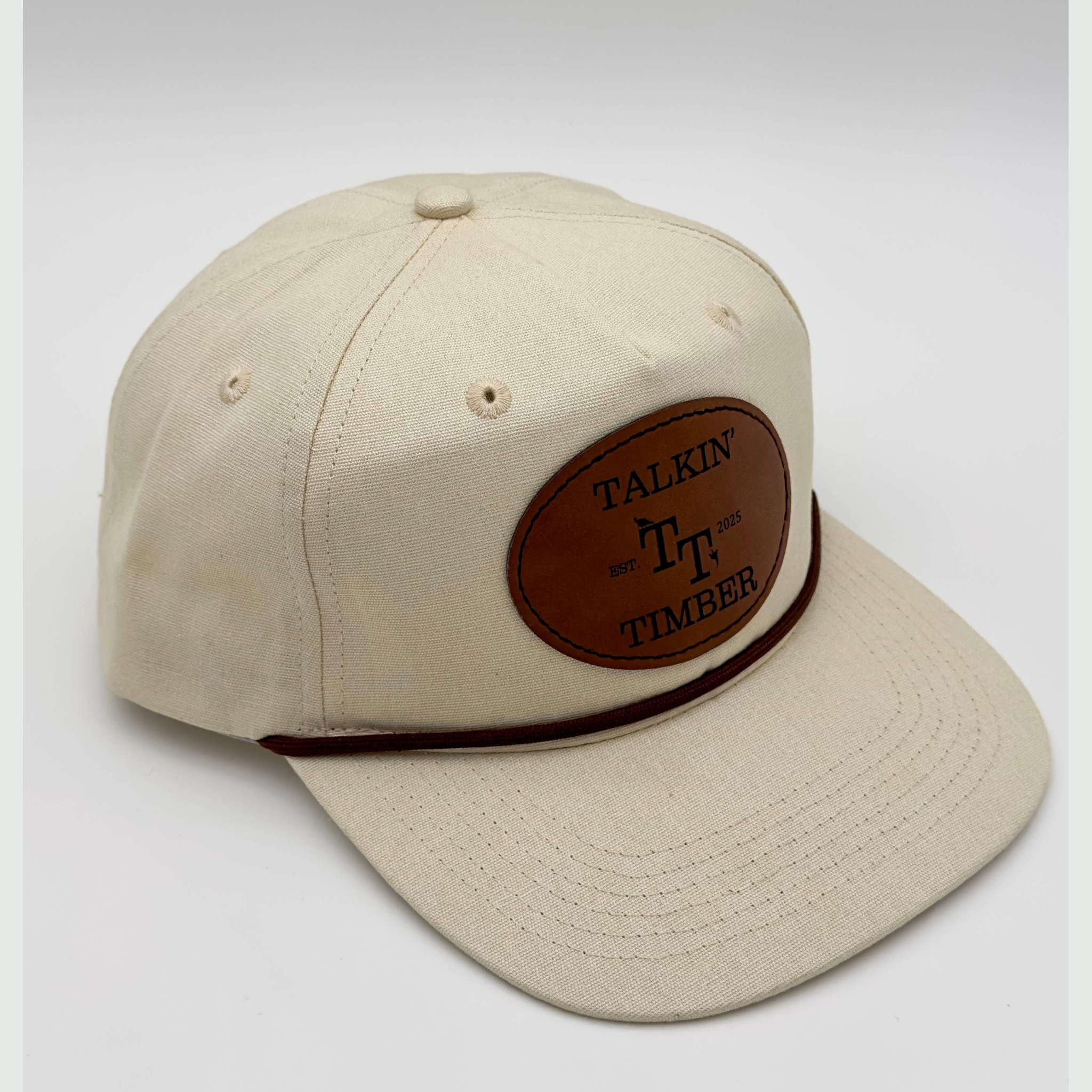 Quartered view of Casual cream rope hat with minimalist design and genuine leather patch, perfect for everyday wear. Golf, going out to eat, or on a date. 